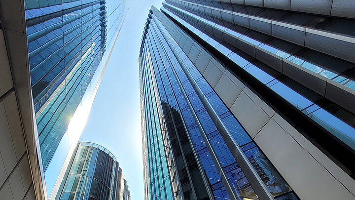 Photo of skyscrapers taken from the pavement